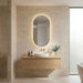 500 x 900mm Oval Pill Polished Edge Frameless LED Bathroom Mirror with three light colours, touchless motion sensor and built-in demisting function