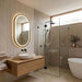 500 x 900mm Oval Pill Matte Black Framed LED Bathroom Mirror with three light colours, touchless motion sensor and built-in demisting function