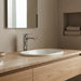 VOG Chrome Short Basin Mixer with polished finish, rounded spout and lever handle